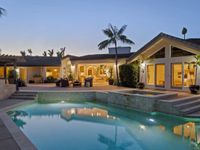 SINGLE-STORY ESTATE ON A SPRAWLING HALF-ACRE LOT