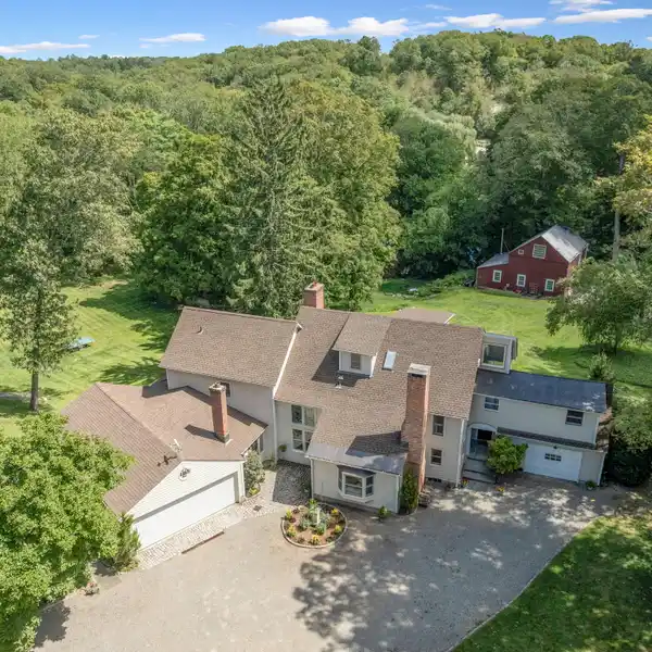 CHARM AND SOPHISTICATION ON THREE ACRES