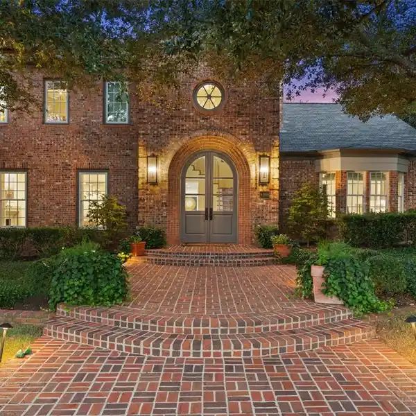 RED BRICK TRADITIONAL WITH A SURPRISING SOFT CONTEMPORARY INTERIOR