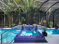 SOPHISTICATED DESIGN, FINE FINISHES AND SMART TECHNOLOGY DEFINE THIS NAPLES HOME