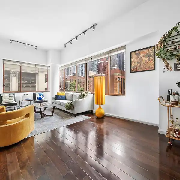 RARE CORNER HOME IN A DESIRABLE BUILDING