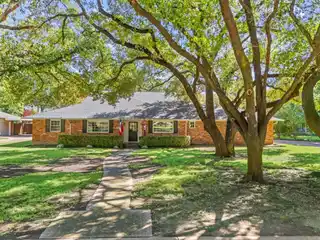 Rare Corner Estate with Grand Oaks and Pool