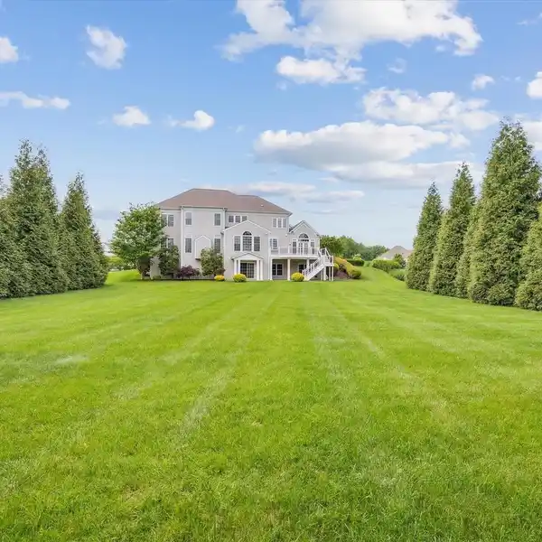 STUNNING STONE-AND-BRICK FRONT COLONIAL
