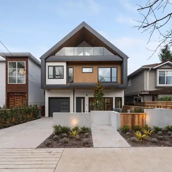 STYLISH CEDAR COTTAGE DUPLEX WITH MODERN UPGRADES