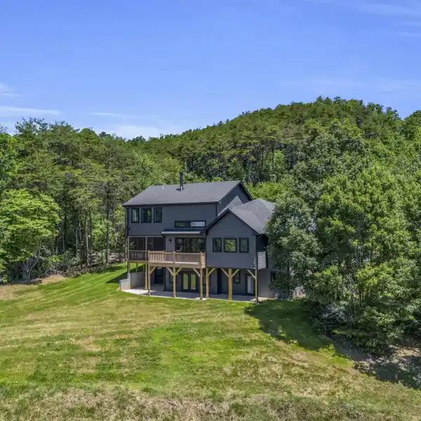 CAPTIVATING CUSTOM HOME ON OVER 15 ACRES