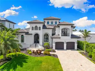 Exquisite Waterfront Home in the Prestigious Conners Community