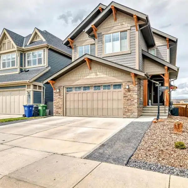 BEAUTIFULLY UPGRADED HOME ALONG THE BOW RIVER
