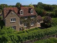 IMPRESSIVE FAMILY HOME IN IDYLLIC VILLAGE SETTING