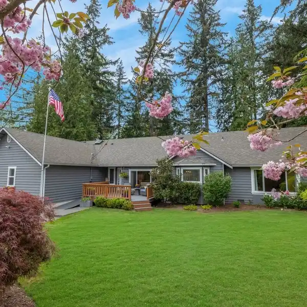 BEAUTIFULLY UPDATED HOME ON THREE PRIVATE ACRES