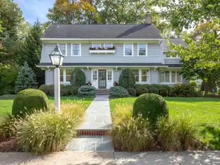 Classic Colonial with Modern Upgrades and Expansive Yard