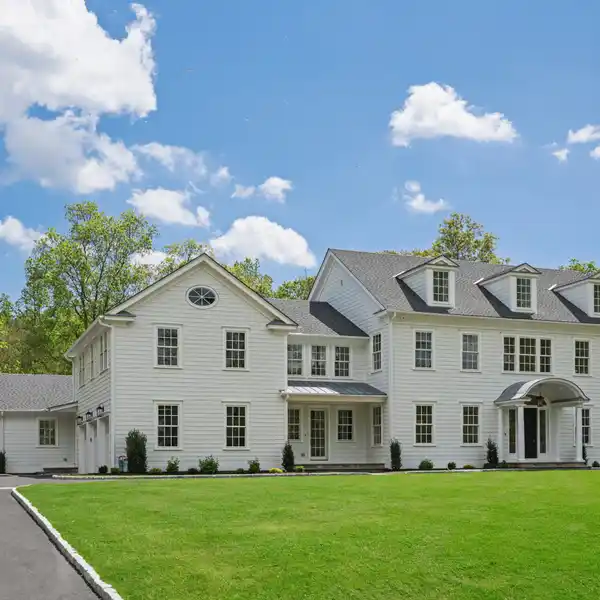 CUSTOM-BUILT ELEGANCE ON TWO PRIVATE ACRES