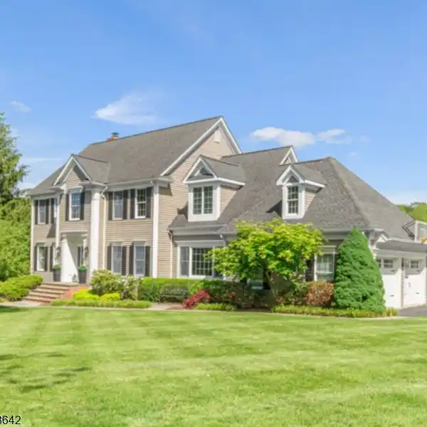 BEAUTIFULLY APPOINTED COLONIAL IN A DESIRABLE ENCLAVE