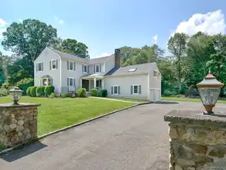 Unique Colonial Home on a Level Corner Lot