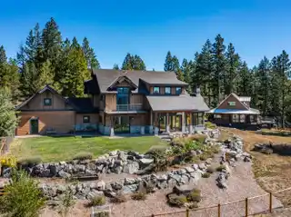 Two Homes on 100-Plus Private Acres