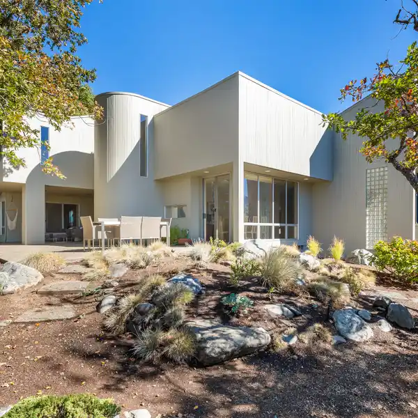 MODERN MASTERPIECE ON FIVE EXPANSIVE ACRES IN EAST MEDFORD HILLS