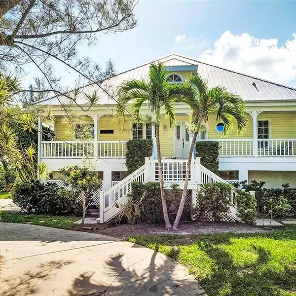 RAISED OLDE FLORIDA STYLE HOME