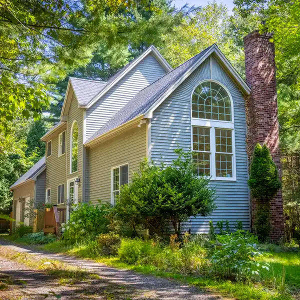 EXPANSIVE LIVING WITH WALLS OF WINDOWS AND BEAUTIFUL OUTDOOR SPACES