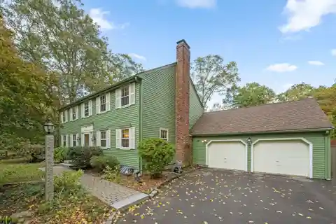 Classic Colonial Charm with Garden Oasis Appeal