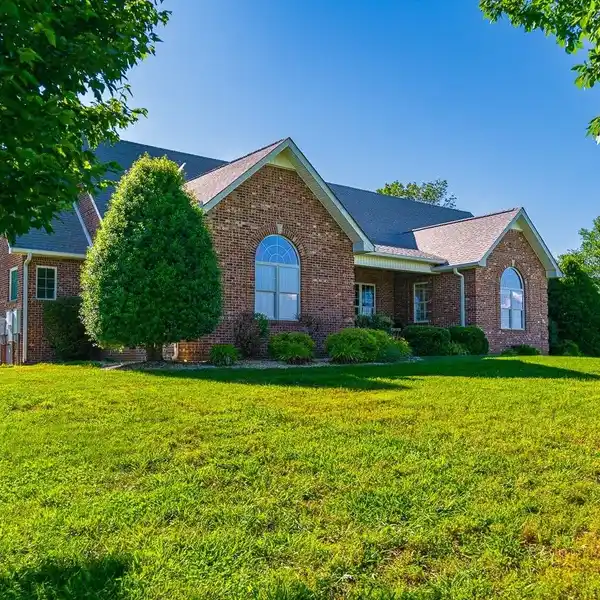 UPDATED HOME WITH GORGEOUS HILLTOP VIEWS ON 33 ACRES