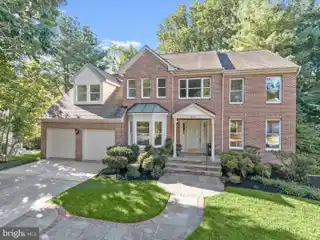 Beautiful Brick-Front Home on a Wooded Lot