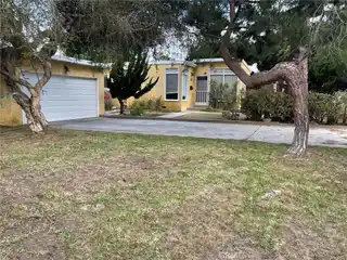 Investor’s Dream on Spacious Corner Parcel