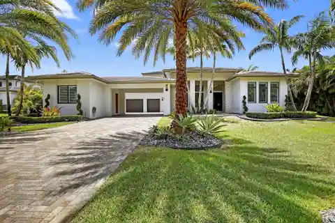 Impressive Two-Story Residence in Exclusive Plantation Acres