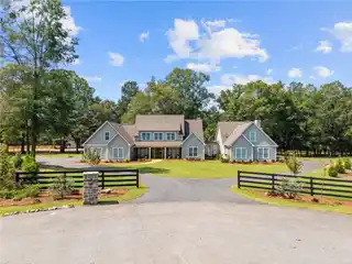 Custom Farmhouse on over Six Acres
