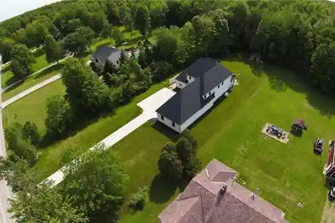 Bold New-Build with Acre of Wooded Privacy