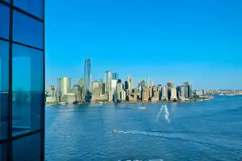 Stunning Corner Unit with Floor-To-Ceiling Windows & Light