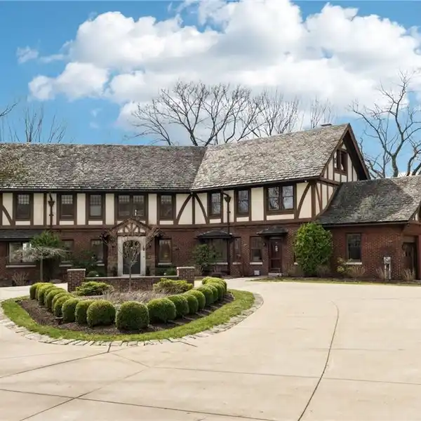 CLASSIC TUDOR WITH TODAY'S FLOOR PLAN AND LIFESTYLE NEEDS