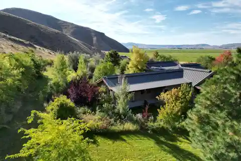 Masterfully Designed Home with a Unrivaled Landscape
