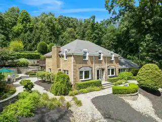 Elegant Colonial on 5 Acres with Pool