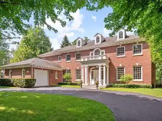 Luxurious Primary Suite with Fireplace and Tray Ceiling