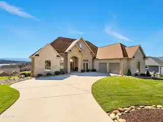 Brick Ranch Home with Breathtaking Lake and Mountain Views