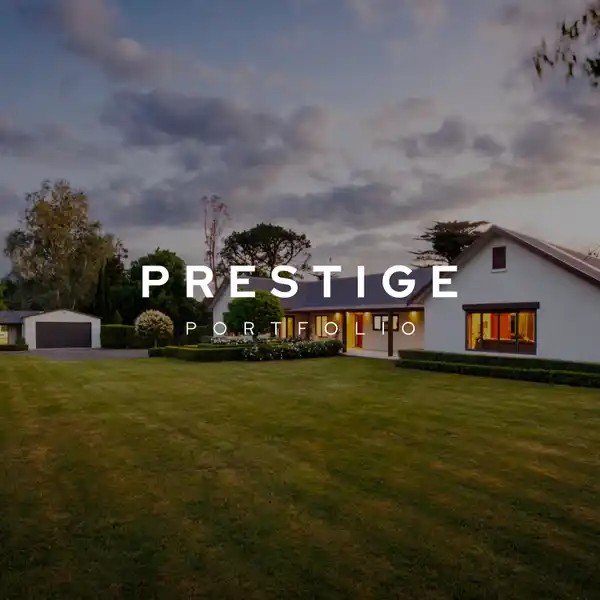 ARCHITECTURAL ELEGANCE ON LUSH LANDSCAPED GROUNDS