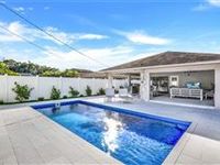 BEAUTIFUL POOL HOME ON A CORNER LOT IN NAPLES PARK
