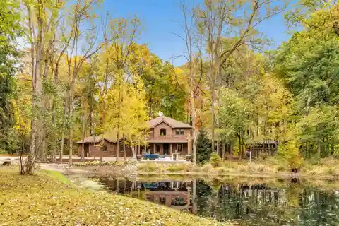 Spacious Great Room with Floor-To-Ceiling Wood-Burning Fireplace