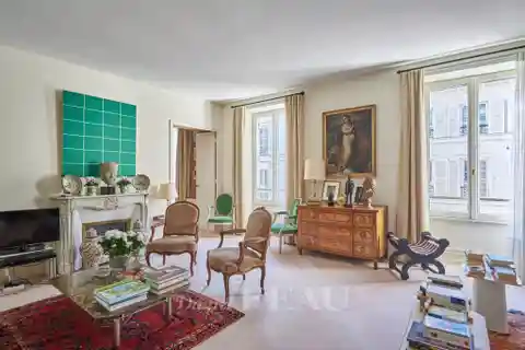Bright Parisian Apartment with Historic Charm and Potential