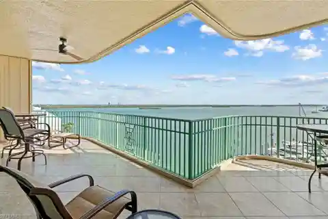 Higher-Floor End Unit with Unrivaled River and Gulf Views