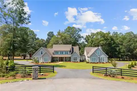 Custom Farmhouse on over Six Acres
