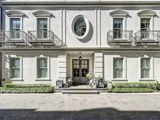 Elegant Gated Residence with Elevator and Gourmet Kitchen