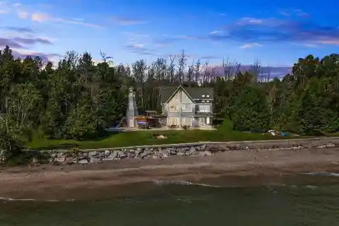 Grand Waterfront Retreat with Private Beach