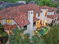 EXCEPTIONAL HOME ON AN EXPANSIVE CORNER LOT 