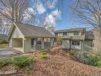 BEAUTIFULLY UPDATED COTTAGE IN THE CHAMPION HILLS GOLF COMMUNITY