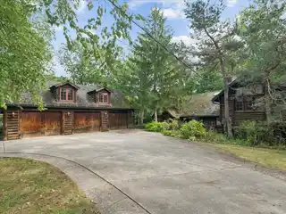 Unique Log Cabin on Wooded Property