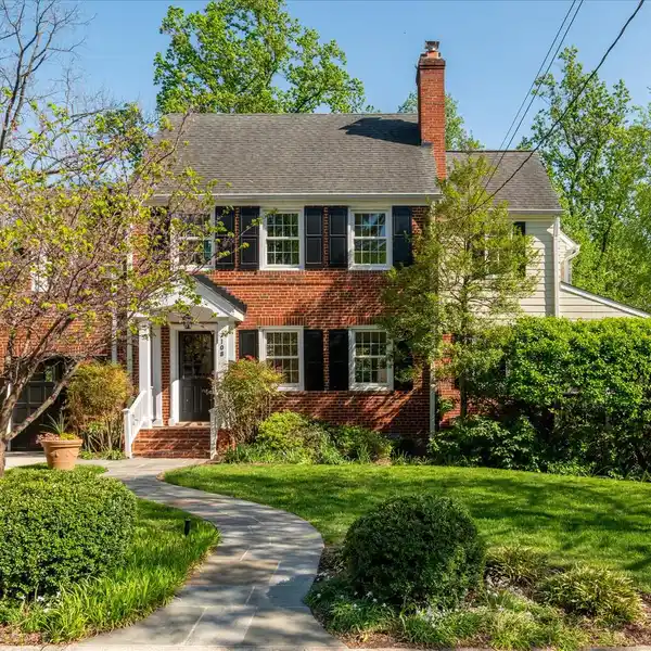 RENOVATED AND DECEPTIVELY SPACIOUS BRICK COLONIAL