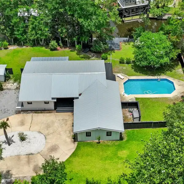 EXTRAORDINARY CANAL-FRONT SANCTUARY SET ON A RARE DOUBLE LOT