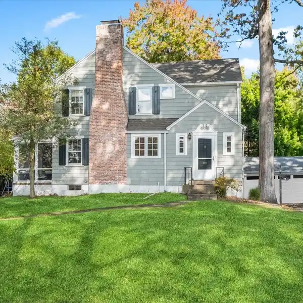 CLASSIC COLONIAL CHARM IN COVETED LOCALE
