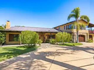 Custom-Built Spanish Contemporary Estate on a Private Acre