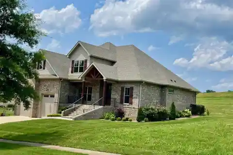Custom Home in the Prestigious Olde Stone Golf Course Community